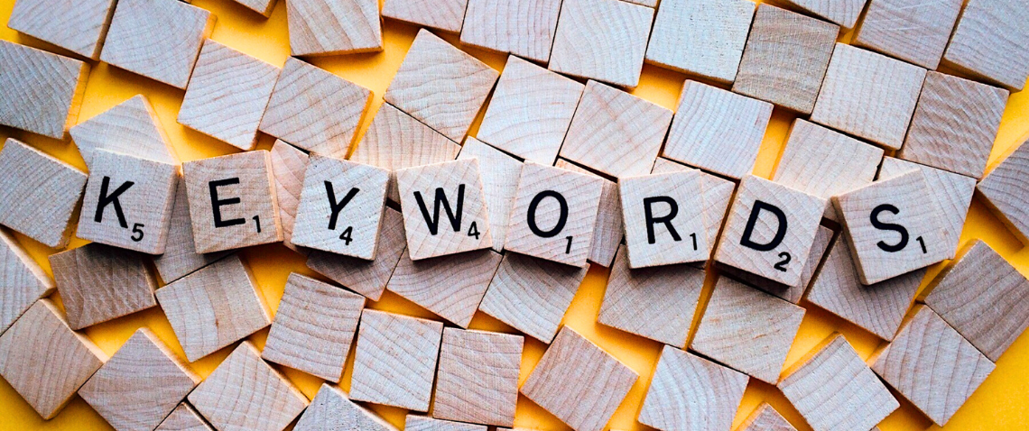 Scrabble tiles spelling out keywords